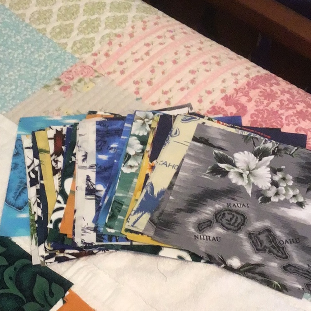 Assorted Hawaiian fabric squares7x7” pics of designs included 68 squares